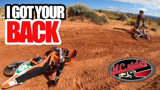 motorcycle rider helping