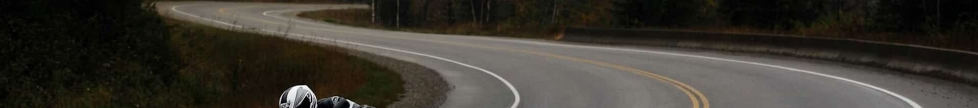 E-469-hero Corner Apex on a motorcycle